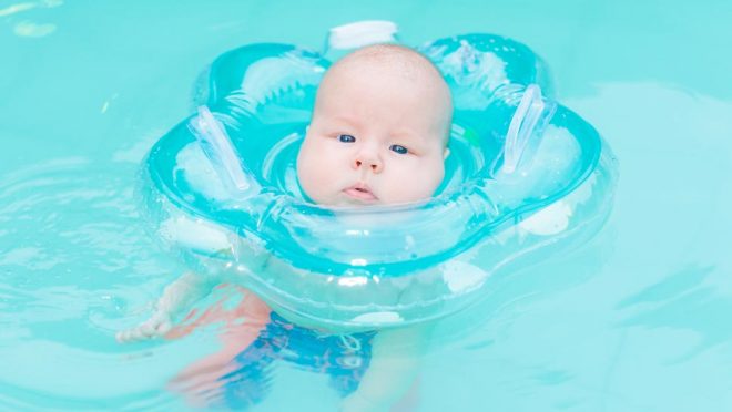 Teaching baby to store float in pool